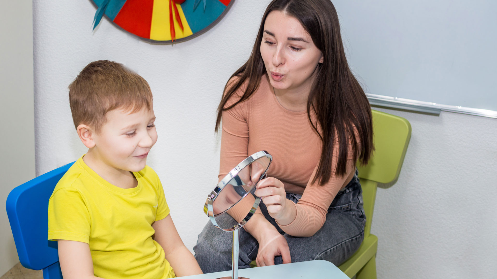 Speech Language Pathologist with child