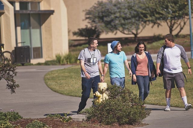 CSUMB students walking on main campus