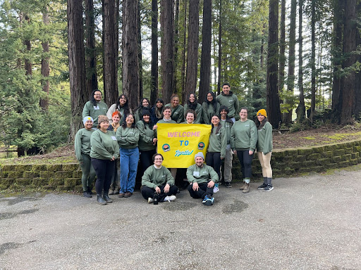 Student and staff participants of the OC3's Ignite Social Justice retreat posing in the redwoods forest