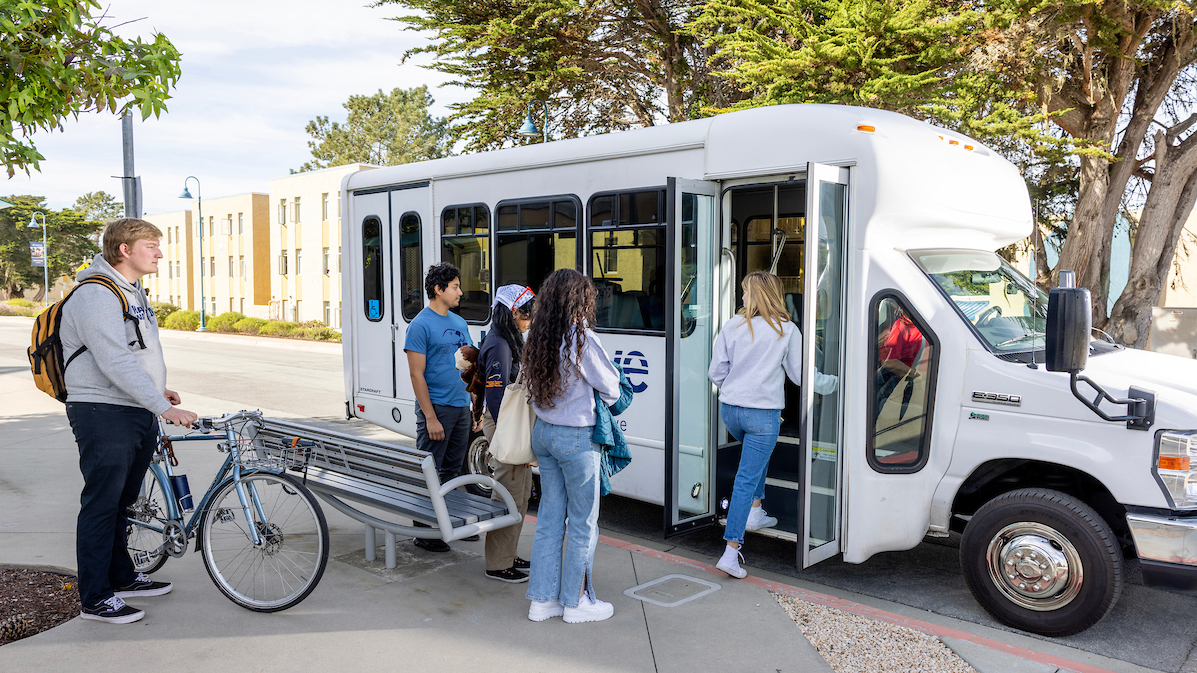 Students boarding the wave shuttle