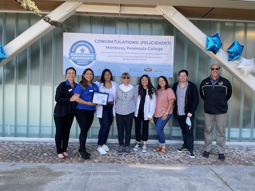 Photo of members of Monterey Peninsula College, Blue Zones Project, & CSUMB Nursing celebrating MPC's designation as a Blue Zone site