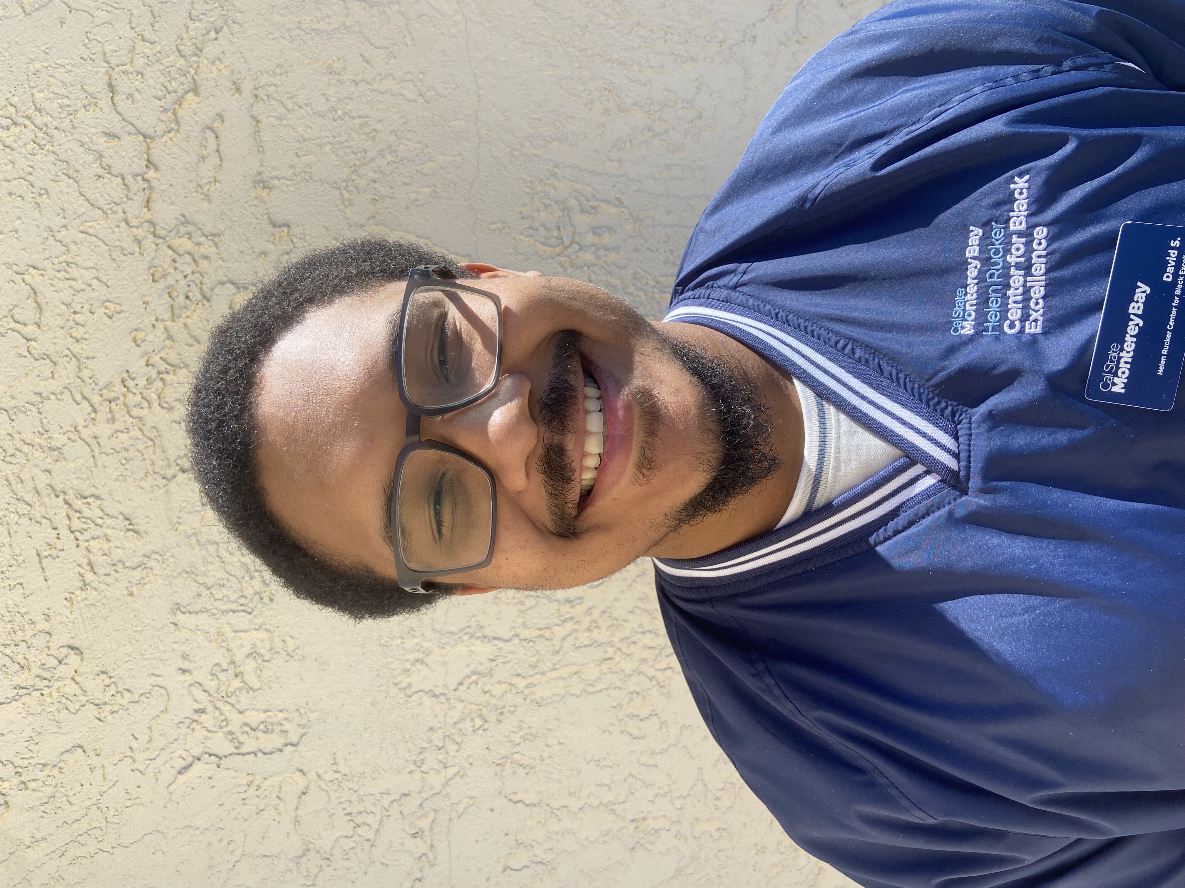 Student Coordinator wearing navy blue windbreaker