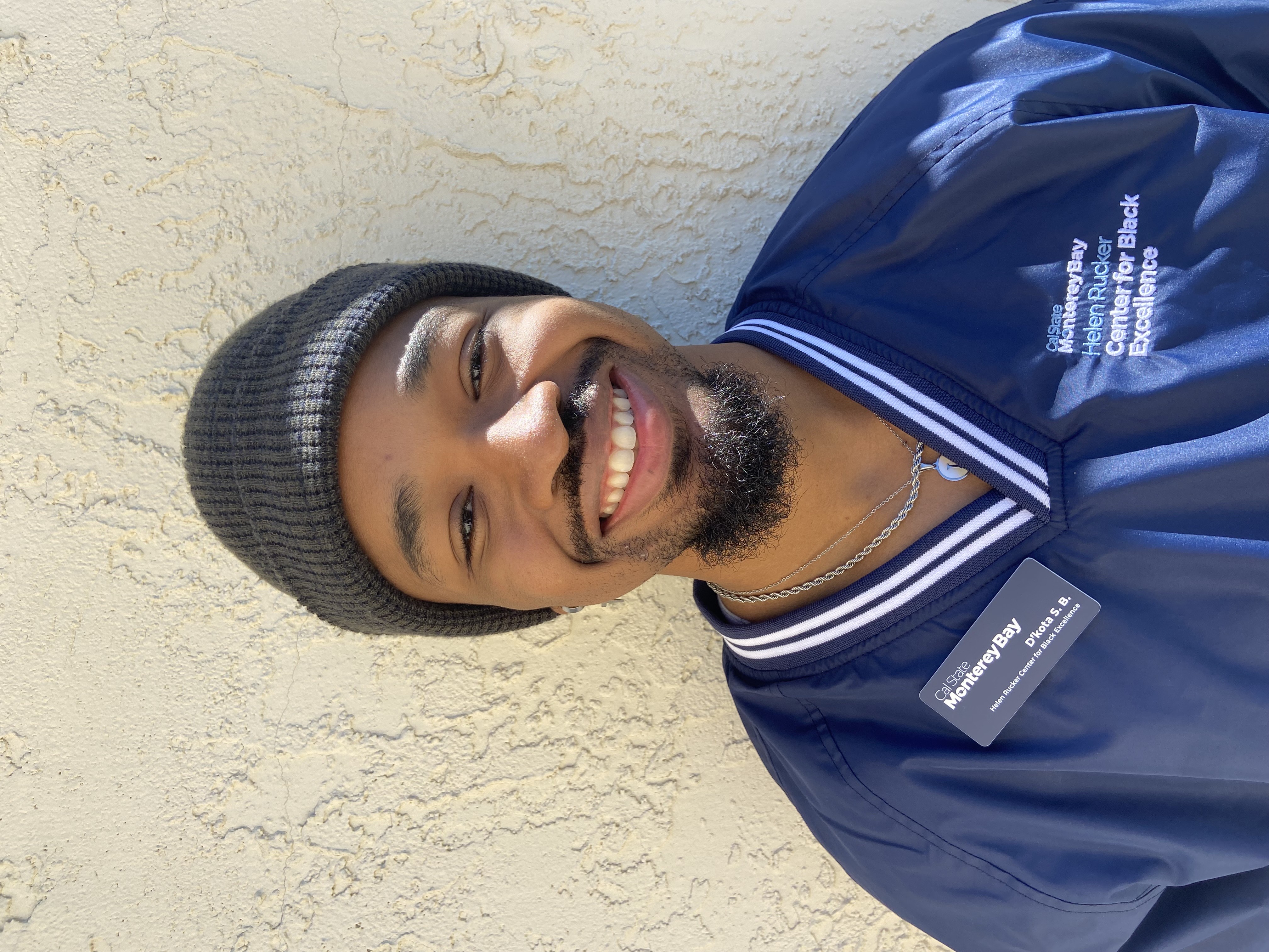 Student Coordinator wearing navy blue windbreaker