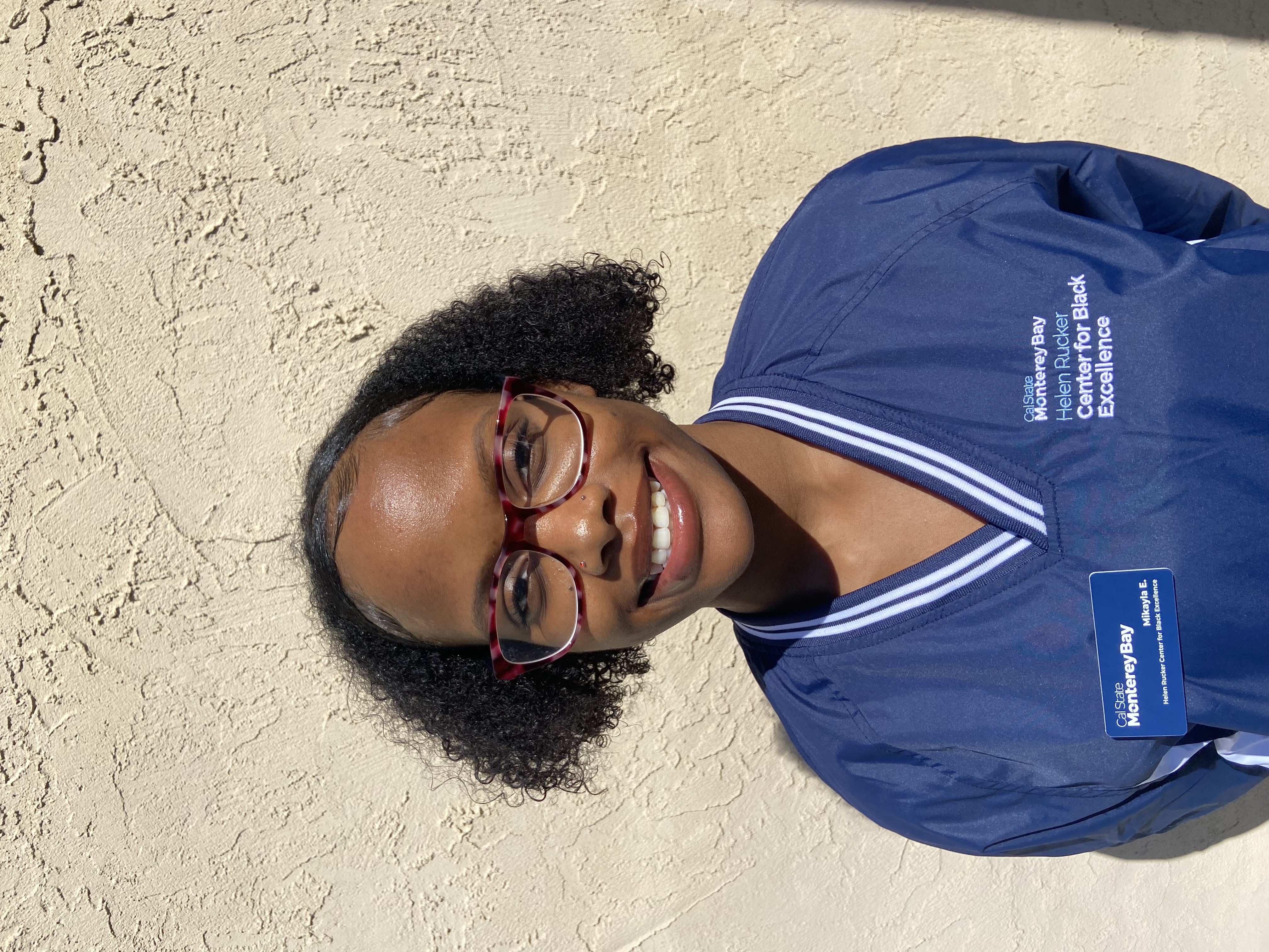 Student Coordinator wearing navy blue windbreaker