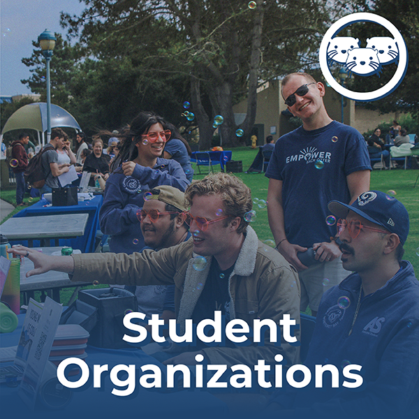 Various students at student organization clubs showcasing school pride