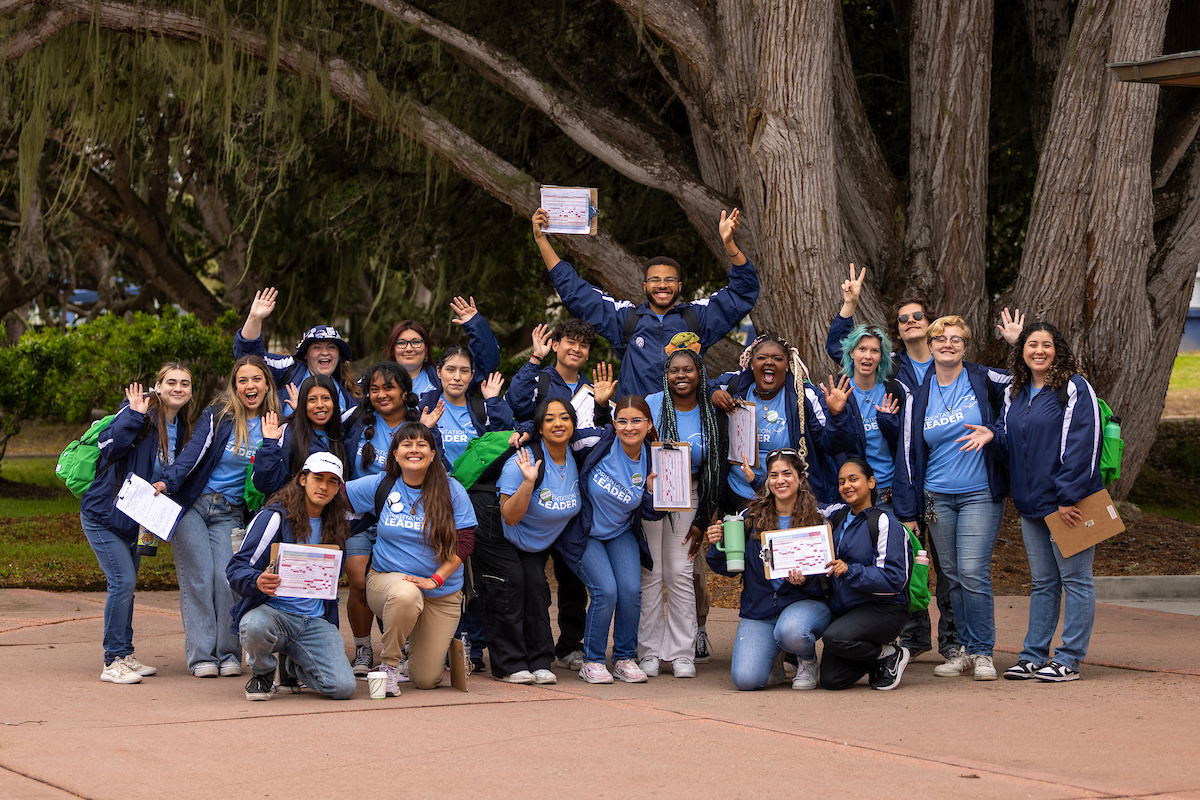 Orientation leaders cheering in a group photo