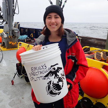 Emily Donahue holding a white bucket