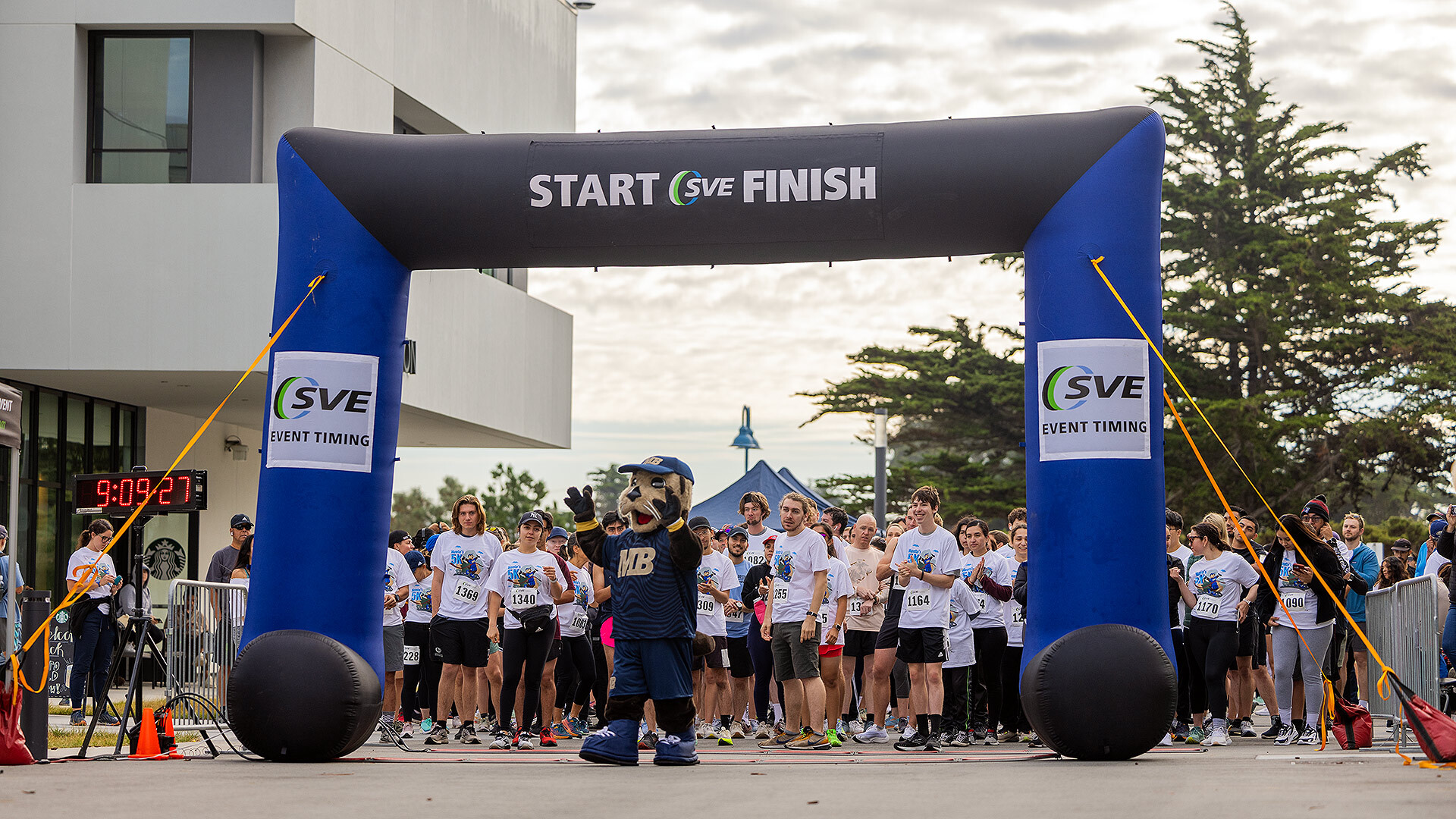 Runners lining up at the start line for Monte's 5K.