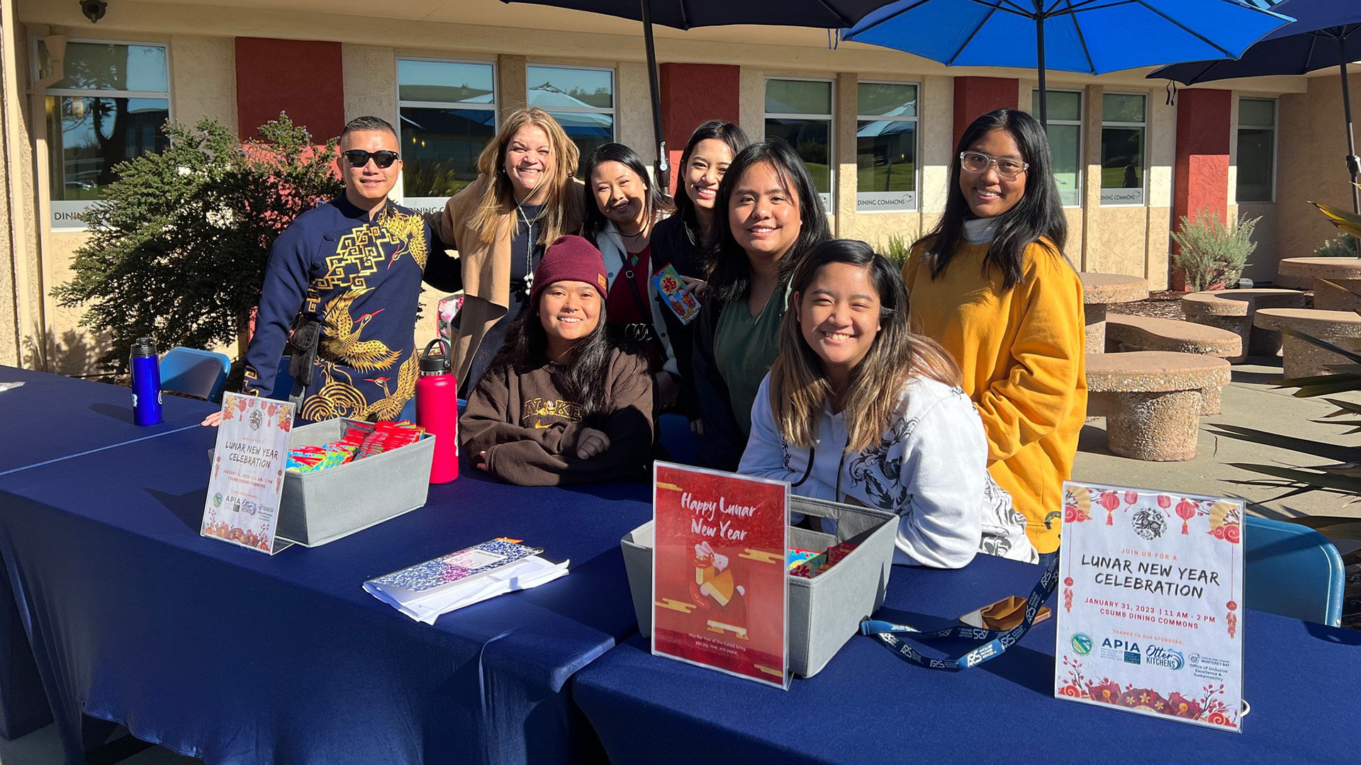 President Vanya Quiñones and members of Asian Pacific Islander Affinity group outside the Campus Dining Commons
