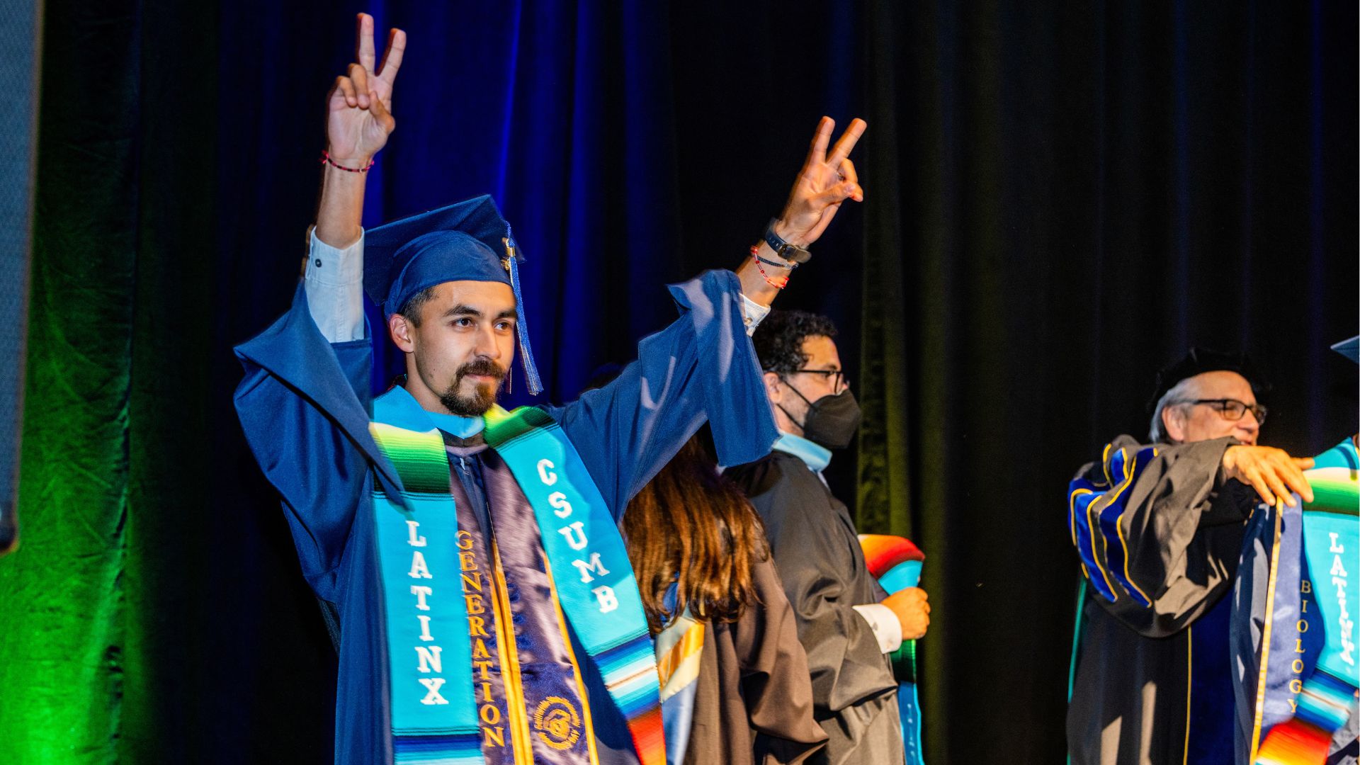 A Latinx student crosses the state at the stole ceremony