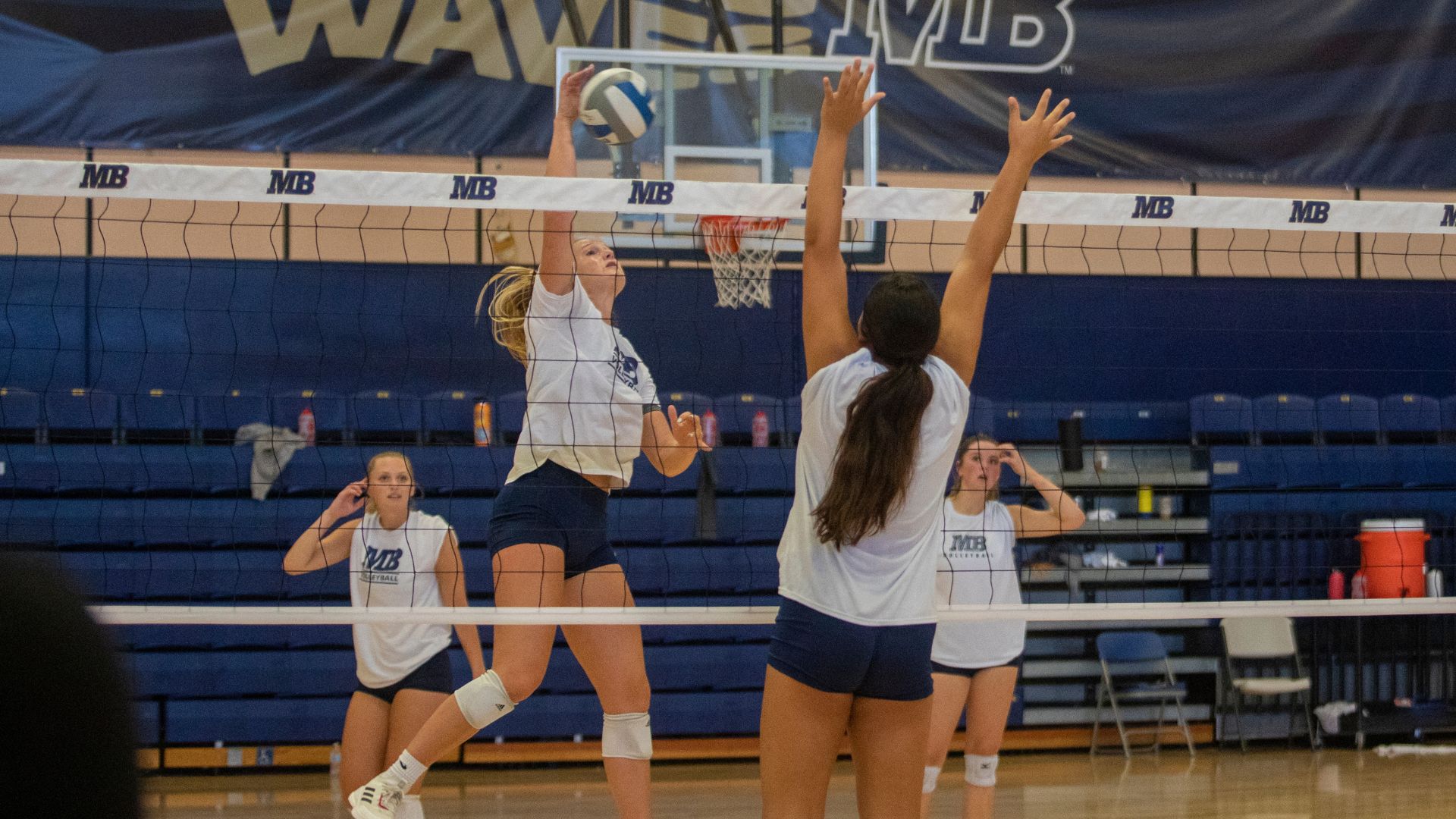 Volleyball players in 2022 practice