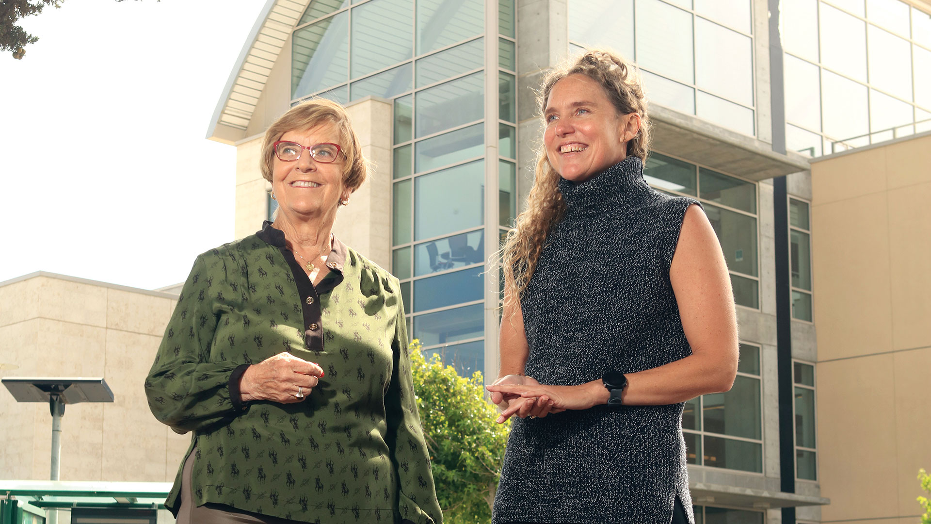 From left: Konny Murray and Jacqueline Grallo, interim library dean, outside the Tanimura & Antle Family Memorial Library at CSUMB. Photo by Randy Tunnell