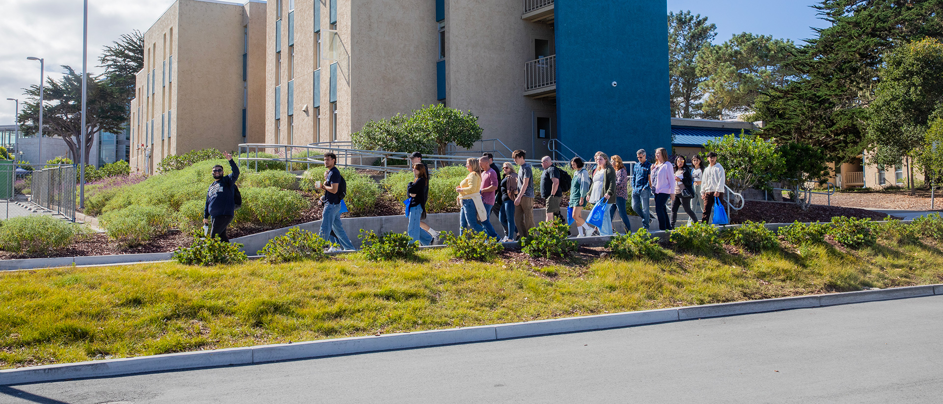 Group of visitors touring the CSUMB campus